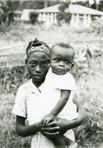 Emmanuel and his nurse, in Ebeigne, Gabon