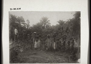 Obemyemi school-children working in the school-yard