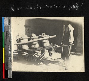 Wooden cart carrying containers of water, Ningbo, Zhejiang, China, ca. 1900