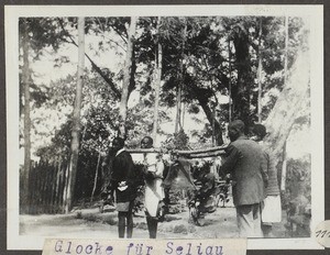 Hanging up a bell, Tanzania, 1928