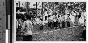 Children playing games, Loting, China, 1939