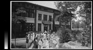 Students coming out of Ninde Chapel, Yenching University, Beijing, China, 1931