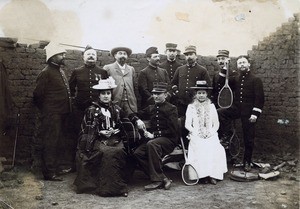 French soldiers with two women and tennis rackets, in Madagascar