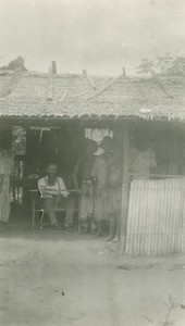 Missionary in a hut, in Gabon