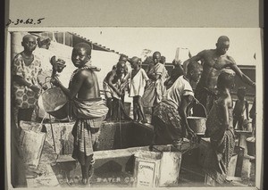 "Children at the water-taps, Kumase"