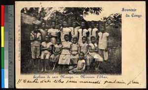 Young students stand together outdoors, Congo, ca.1920-1940