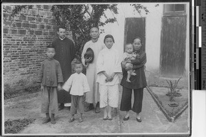 Fr. Walker with catechist and family, Fahsien, China, 1925