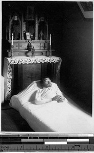 Body of deceased Japanese man laid out before the family altar, Hakodate, Japan, ca. 1920-1940