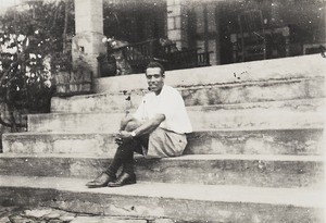 Dr Savage on steps, Ama Achara, Nigeria, ca. 1934