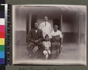 Portrait of indigenous teacher and his family, Africa. ca. 1910-1920