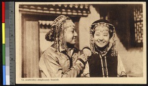 Young women in traditional headdress and clothing, China, ca.1920-1940