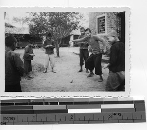 Chinese boys playing at Luoding, China, 1936