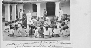 Arcot District, South India. Siloam Girl's Boarding School. Mealtime. The matron distributes ve
