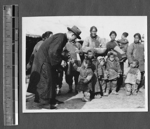 Student visiting refugees, Jinan, Shandong, China, ca.1928