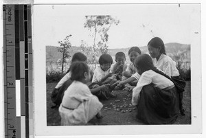 Girls playing marbles, Masan, Korea, ca. 1920-1940