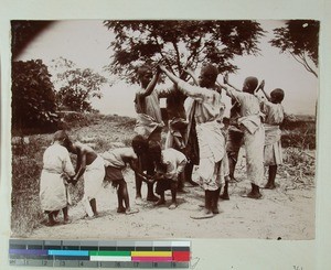 Boys playing a Malagasy version of a children's game, Madagascar, ca.1900