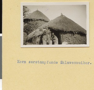 Women pounding grain, Ethiopia