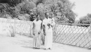 Danish Mission Hospital, Tirukoilur, Arcot, South India. The Pharmacist Ponniah with wife and c