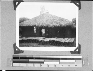 Men working on a hut, Bandawe, Malawi, 1936