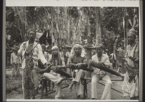 Traditional priests at a funeral on the upper Kahajan