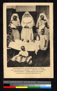 Missionary sisters tending children, Benin, ca.1920-1940