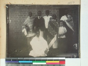 A group Malagasy men and one missionary child, Madagascar, ca.1908