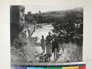 Sitting in a carrying chair after crossing the Sakeny River, Madagascar