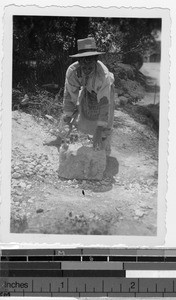 Indian man cutting stone for convent, Guatemala, ca. 1946