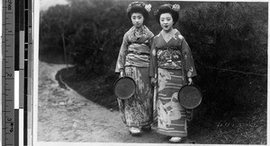 Two girls standing by a road, Japan, ca. 1920-1940