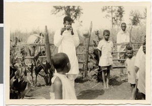 Pastor Dafaa taking a photograph, Ayra, Ethiopia, 1952