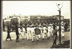 Chinese funeral in Kowloon. Photograph by Rev. Weickum, Fopin. A band heads the procession the whole day