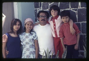 Family outside their home