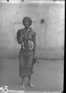 Female sorcerer, Makulane, Mozambique, ca. 1896-1911