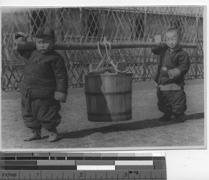 Orphans getting hot rice at Wuzhou, China, 1947