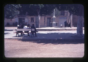 men on a park bench