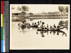 Two men fishing with cormorant birds, Jiangsu, China, ca.1900-1932