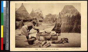 Woman making wine from corn, Togo, ca. 1920-1940