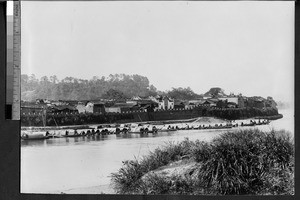 A fortified Chinese town on the banks of the Min River, Fujian, China, ca. 1910