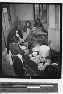 Maryknoll Sister with novices preparing meal at Jiangmen, China, 1940