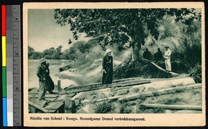 Missionary father stepping off a dock, Congo, ca.1920-1940