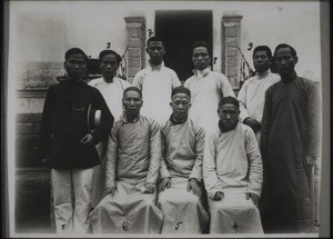 Chinese members of the staff of the mission station Honyen. Nos. 1-4 are teachers of the secondary school, No. 5 is the pastor, No. 6 is language teacher and elder of the congregation, Nos. 7 & 8 are elementary school teachers, No. 9 is the chinese doctor who runs the hospital with Miss Herwig