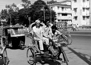 Stephen Baroi and Jørgen Nørgaard Pedersen driving by rickshaw at Dhaka, Bangladesh 1983. A bab