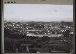 Fopin. Town and market, the latter outside the walls by the river, on the right the mission station