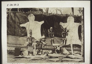 Decorating the outer wall of the King's compound in Bali