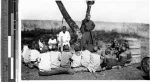 Priest preparing first Holy Communion class, Musoma, Tanzania, Africa, 1949