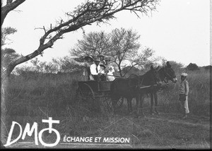 Missionary with family in a cart, Mozambique, ca. 1896-1911