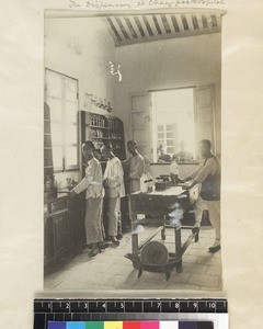 Staff in the dispensary at Zhangpu mission hospital, Fujian Province, China, ca. 1899-1906