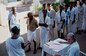 Missionary nurse Helga Johansen distributes medicin at Vadathorasalur hospital, South India