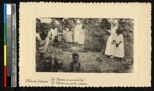 Missionary sisters with children in a vegetable garden, Katanga, Congo, ca.1920-1940