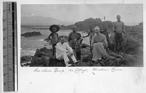 People at rocky shoreline, Wenzhou, Zhejiang, China, ca.1900